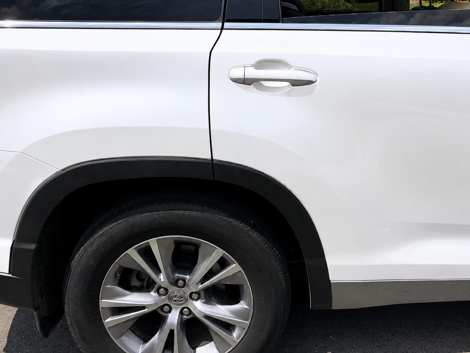 Rear door crease dent — after